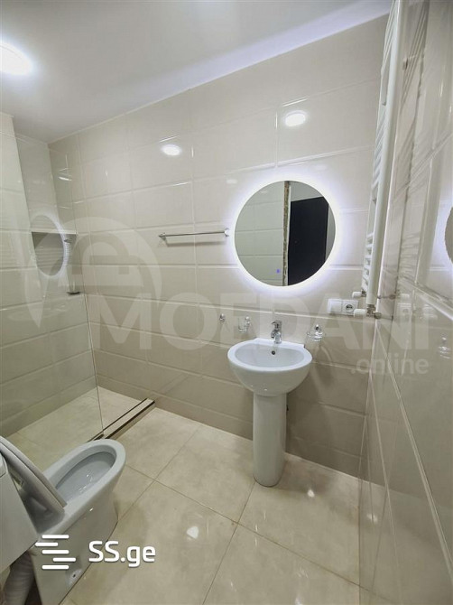 იყიდება 2 ოთახიანი ბინას 57მ² 5/19 სართ თბილისი - photo 1