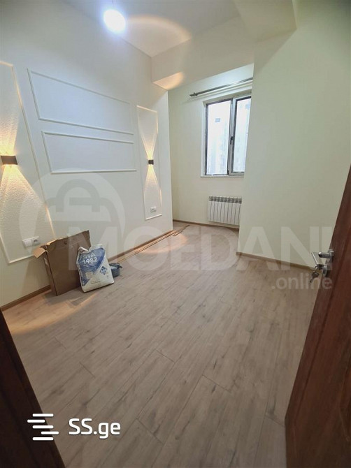 იყიდება 2 ოთახიანი ბინას 54მ² 7/17 სართ თბილისი - photo 4