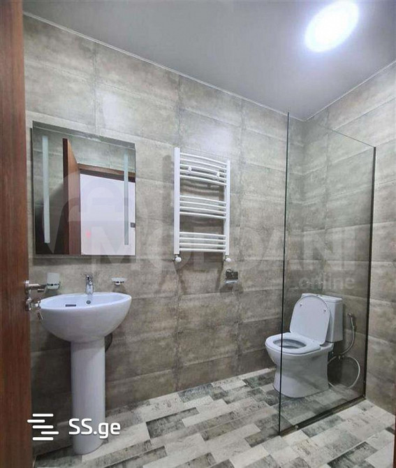 იყიდება 2 ოთახიანი ბინას 54მ² 7/19 სართ თბილისი - photo 1