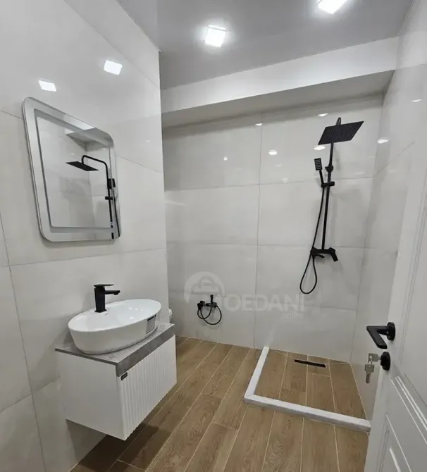 იყიდება 2 ოთახიანი ბინას 54მ² 15/15 სართ თბილისი - photo 2