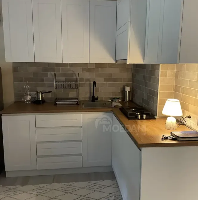 იყიდება 1 ოთახიანი ბინას 55.7მ² 4/4 სართ ბორჯომი - photo 1