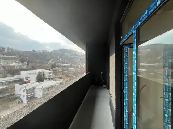 იყიდება 2 ოთახიანი ბინას 56მ² 12/12 სართ თბილისი