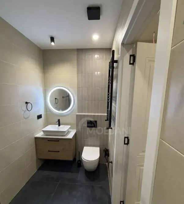 იყიდება 2 ოთახიანი ბინას 55.7მ² 24/25 სართ თბილისი - photo 8