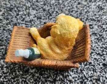 Statue of a dog in a basket Tbilisi