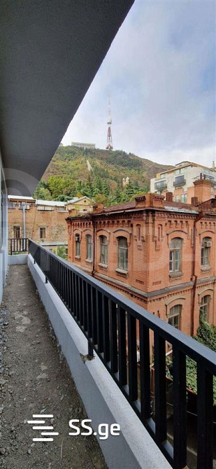 იყიდება 3 ოთახიანი ბინას 92მ² 3/8 სართ თბილისი - photo 1