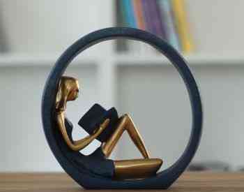 Reading a souvenir book Tbilisi