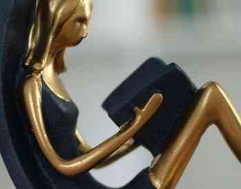 Reading a souvenir book Tbilisi