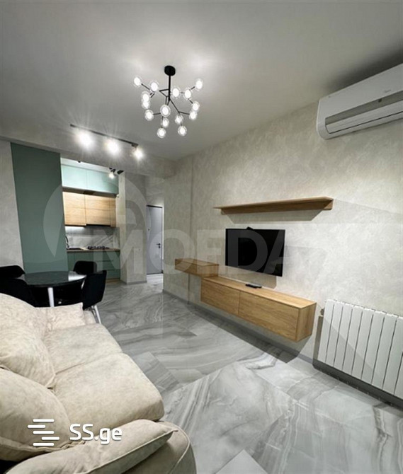 იყიდება 2 ოთახიანი ბინას 55მ² 13/25 სართ თბილისი - photo 1