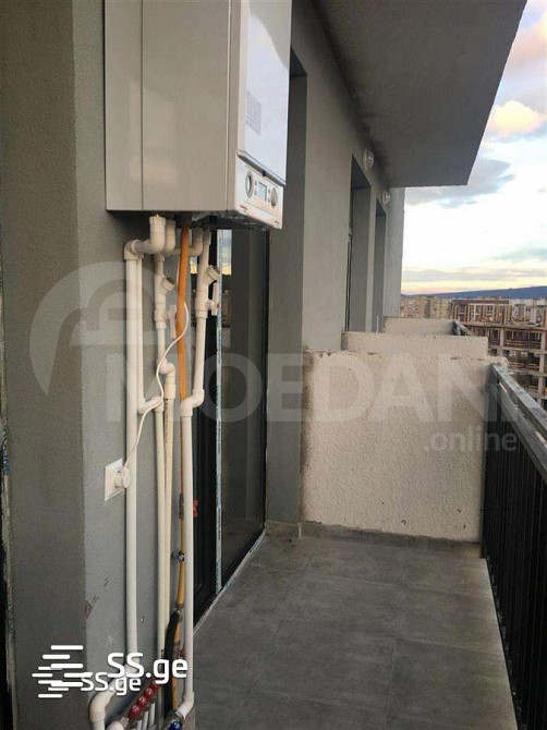 Apartments For Sale three-room 58м² 12/12 floor Tbilisi - photo 2