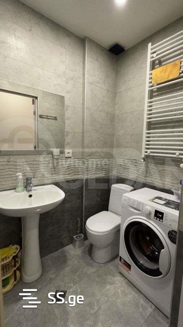 იყიდება 2 ოთახიანი ბინას 28მ² 10/10 სართ თბილისი - photo 2