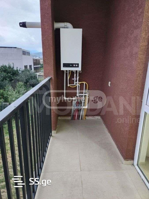 იყიდება 3 ოთახიანი ბინას 52.5მ² 4/7 სართ თბილისი - photo 4