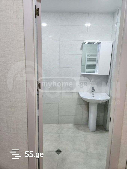 იყიდება 3 ოთახიანი ბინას 52.5მ² 4/7 სართ თბილისი - photo 3