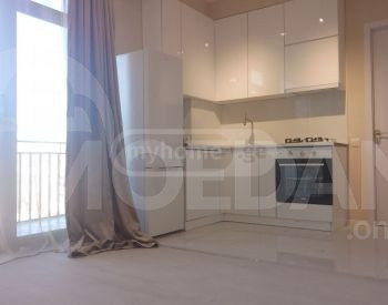 იყიდება 2 ოთახიანი ბინას 57მ² 11/13 სართ თბილისი - photo 8