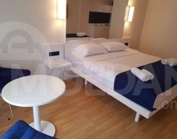 იყიდება 1 ოთახიანი ბინას 28მ² 24/50 სართ თბილისი - photo 1