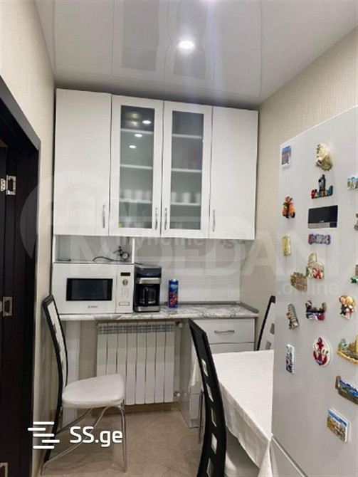 იყიდება 4 ოთახიანი ბინას 70მ² 1/12 სართ თბილისი - photo 7