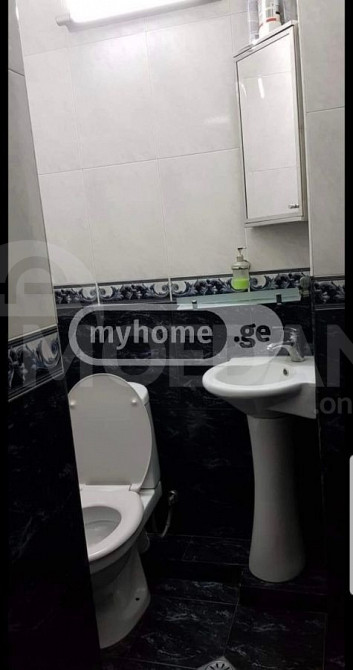 იყიდება 3 ოთახიანი ბინას 130მ² 1/9 სართ თბილისი - photo 8