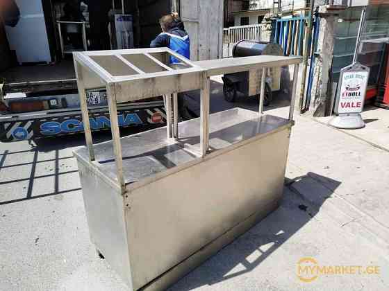 უჟანგავი ლითონის სამუშაო მაგიდა თაროებით, და საჭმლის ხაზით ე თბილისი