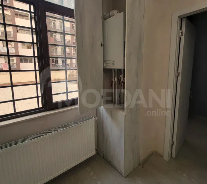 იყიდება 3 ოთახიანი ბინას 70მ² 1/12 სართ თბილისი - photo 6