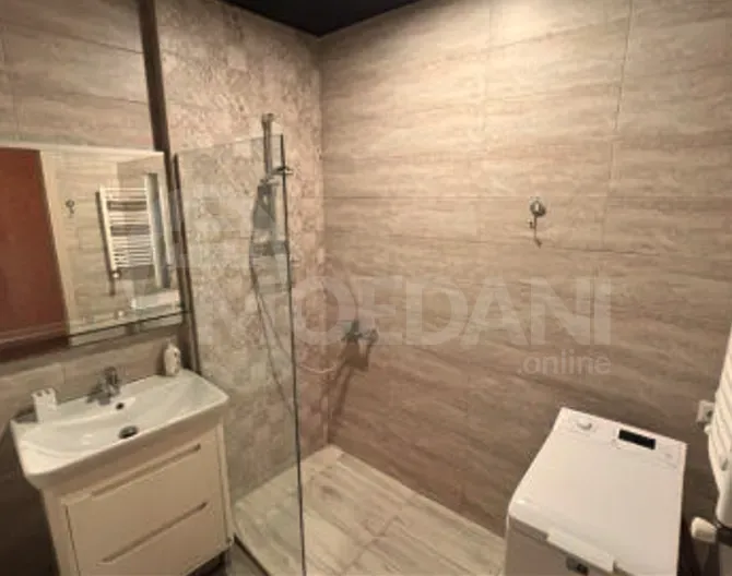 ქირავდება 2 ოთახიანი ბინა 74მ² 5/12 სართ თბილისი - photo 2