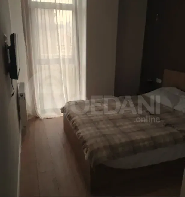 ქირავდება 2 ოთახიანი ბინა 58მ² 7/19 სართ თბილისი - photo 1