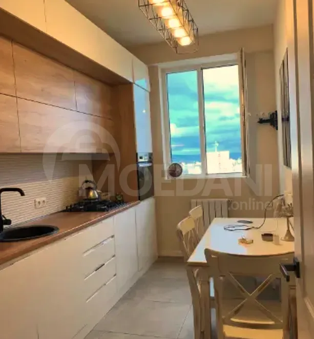 იყიდება 3 ოთახიანი ბინას 80მ² 13/16 სართ თბილისი - photo 2