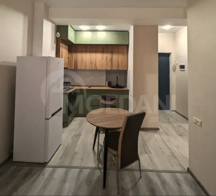 ქირავდება 2 ოთახიანი ბინა 50მ² 5/15 სართ თბილისი - photo 2