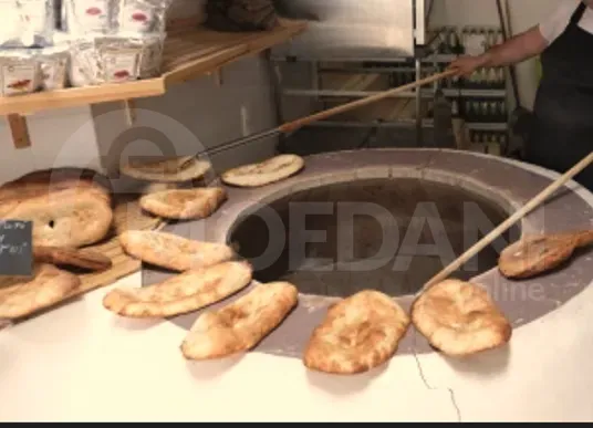 Продавец хлеба в Оне Тбилиси - изображение 1