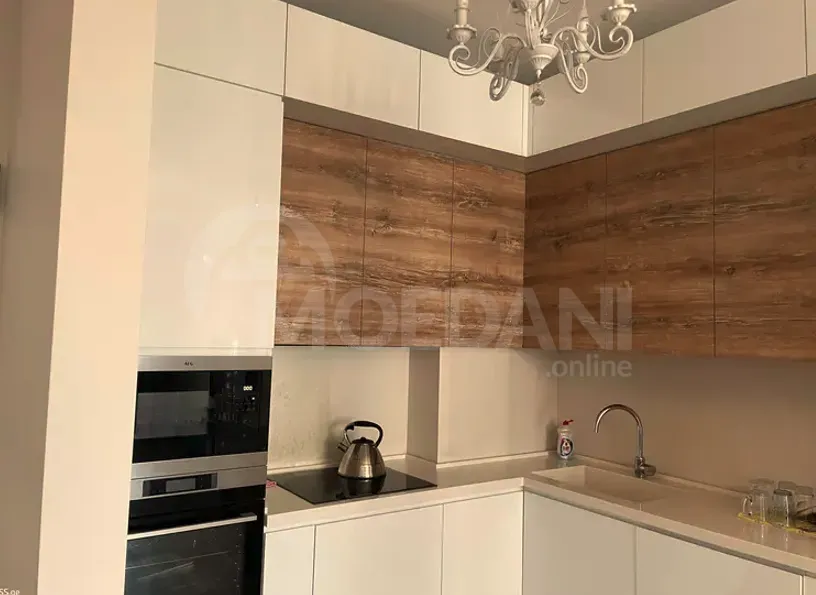 ქირავდება 2 ოთახიანი ბინა 75მ² 4/8 სართ თბილისი - photo 1