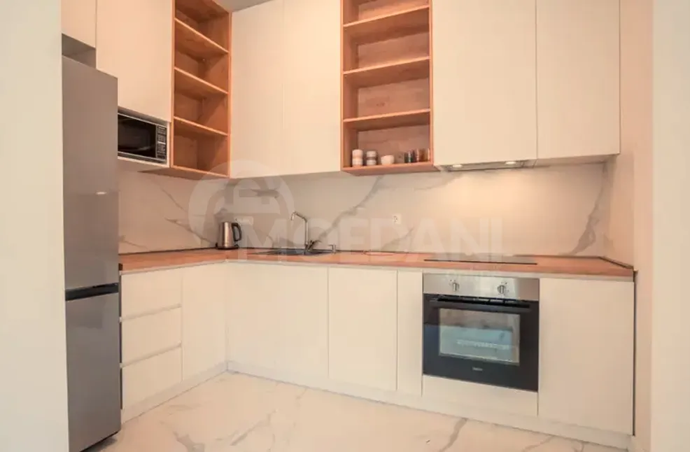 ქირავდება 2 ოთახიანი ბინა 74მ² 2/5 სართ თბილისი - photo 4