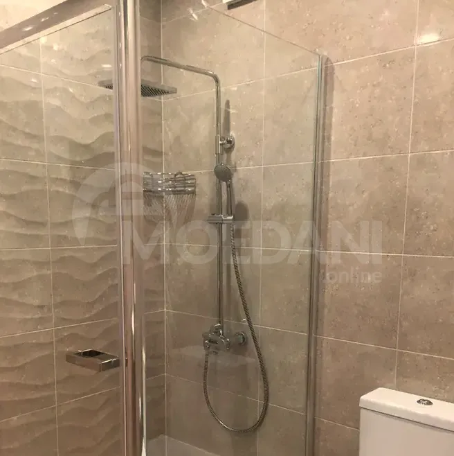 ქირავდება 2 ოთახიანი ბინა 57მ² 11/16 სართ თბილისი - photo 2