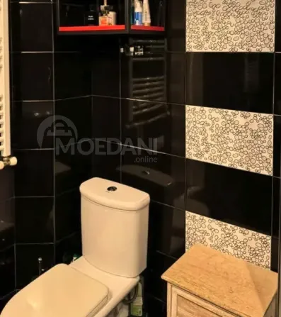 იყიდება 2 ოთახიანი ბინას $106 000  თბილისში  70მ² 3/5 სართ თბილისი - photo 11