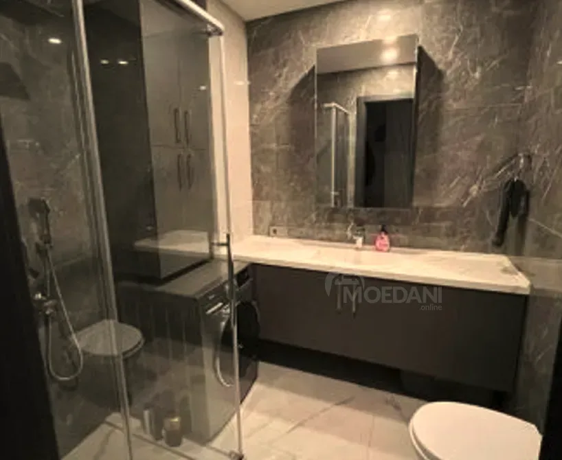 იყიდება 2 ოთახიანი ბინას 72მ² 18/18 სართ თბილისი - photo 12