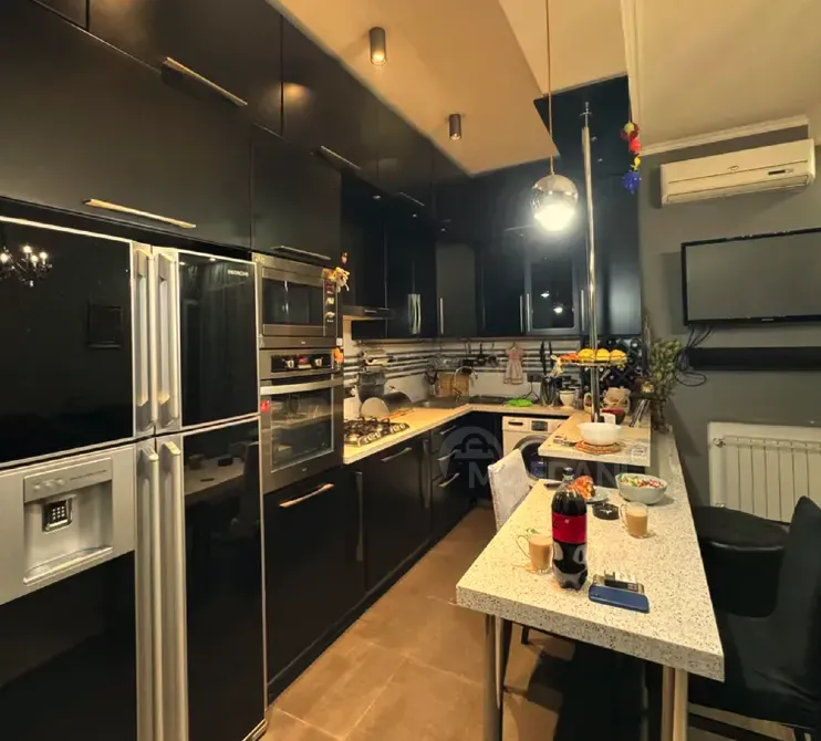 იყიდება 2 ოთახიანი ბინას 57მ² 1/9 სართ თბილისი - photo 5