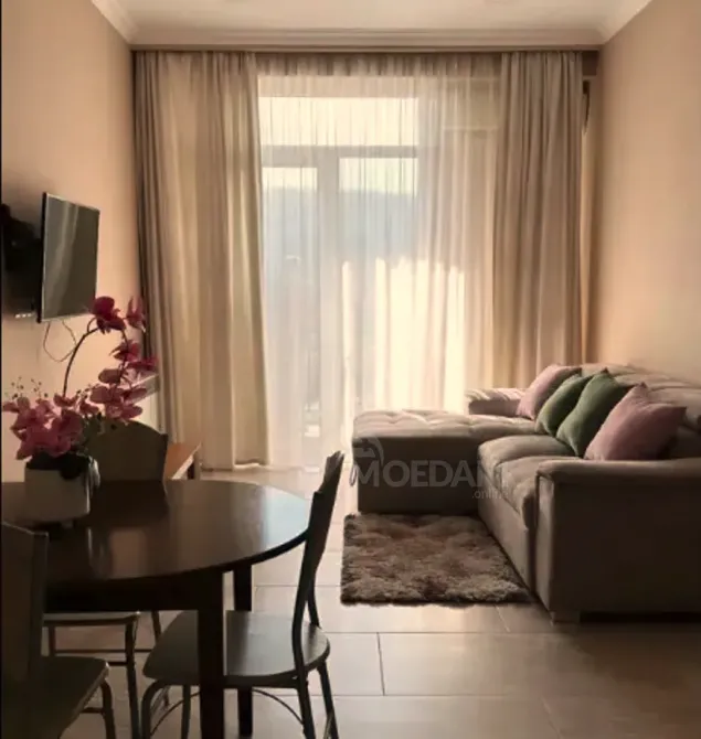 იყიდება 2 ოთახიანი ბინას 63მ² 11/18 სართ თბილისი - photo 1