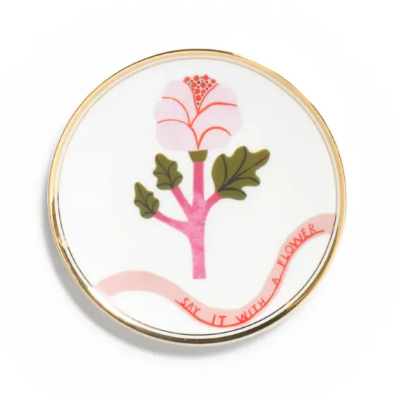 A colorful porcelain plate is for sale. Tbilisi