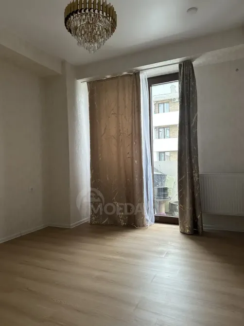 იყიდება 2 ოთახიანი ბინას 57.2მ² 11/15 სართ თბილისი - photo 11