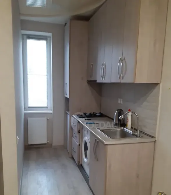 ქირავდება 2 ოთახიანი ბინა 30მ² 4/7 სართ თბილისი - photo 10